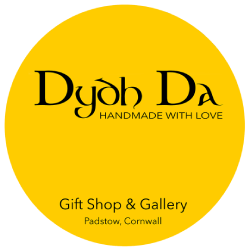 yellow circle logo with the words Dydh Da Handmade with Love. Gift shop and Gallery in Padstow, Cornwall